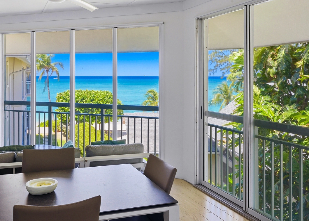Balcony Table Chairs Oceanview at The Cayman Club Condo 25 on Seven Mile Beach Grand Cayman
