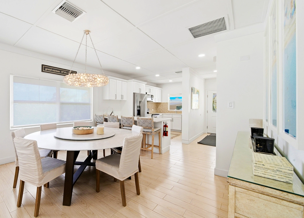 Dining Room to Entry at The Cayman Club Condo 25 on Seven Mile Beach Grand Cayman
