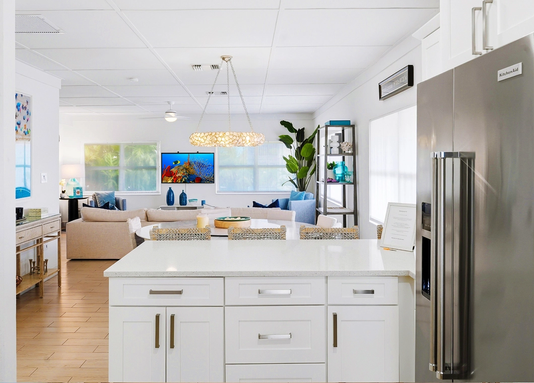 Kitchen Dining Room Tv at The Cayman Club Condo 25 on Seven Mile Beach Grand Cayman