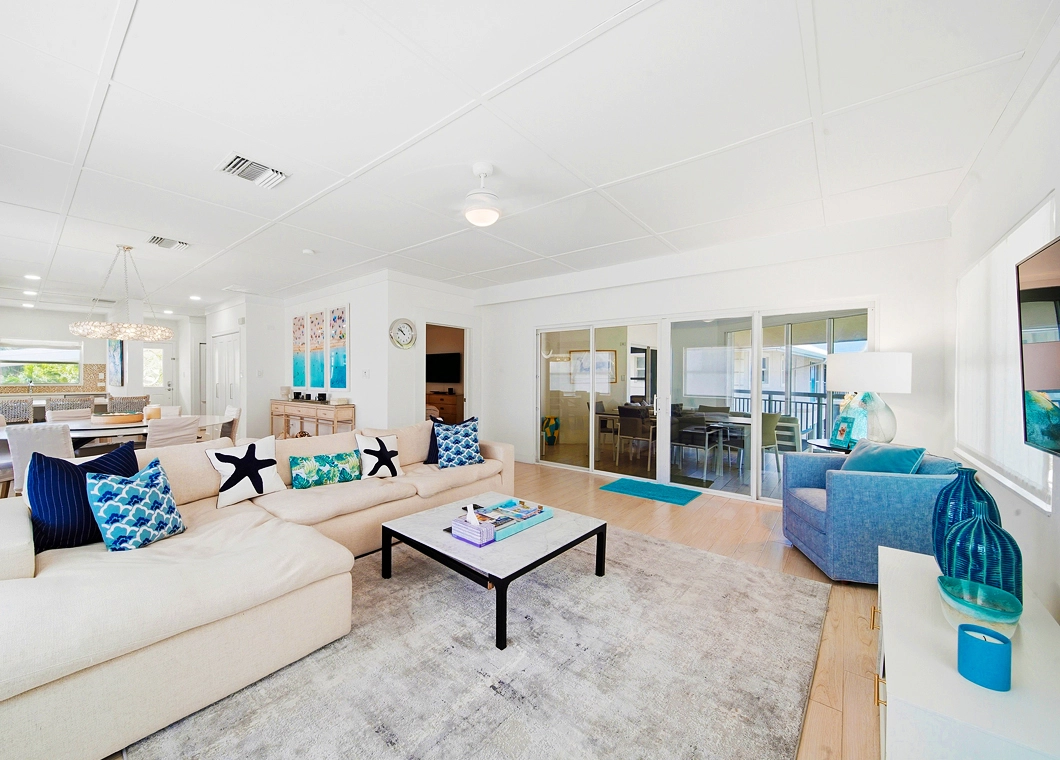 Living Room to Kitchen1060x760 at The Cayman Club Condo 25 on Seven Mile Beach Grand Cayman